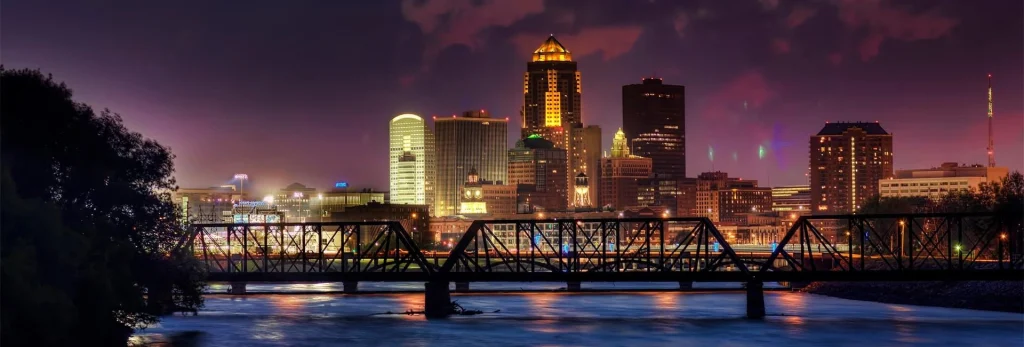 The lights of the downtown Des Moines, Iowa, skyline shine at night